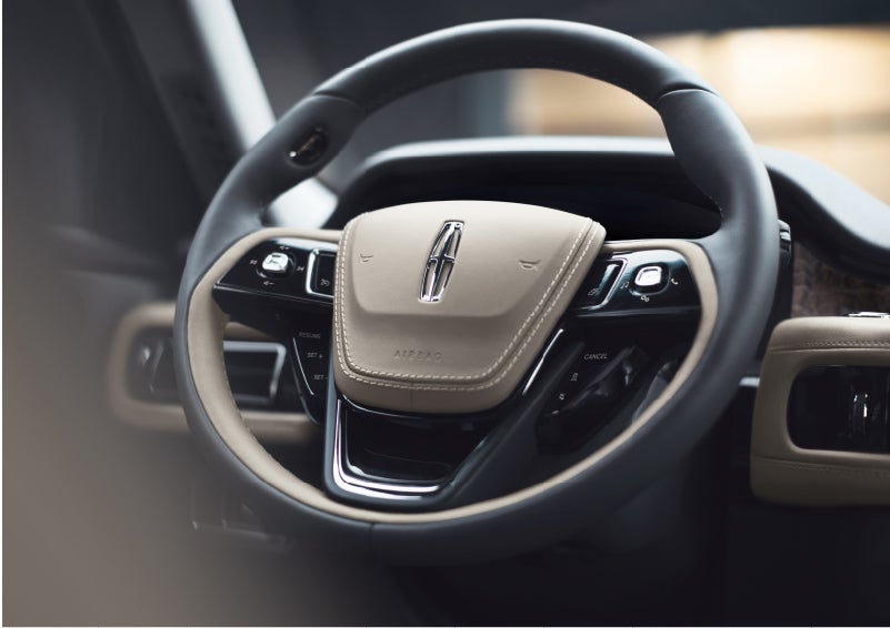 The intuitively placed controls of the steering wheel on a 2023 Lincoln Aviator® SUV | Caruso Lincoln in Long Beach CA